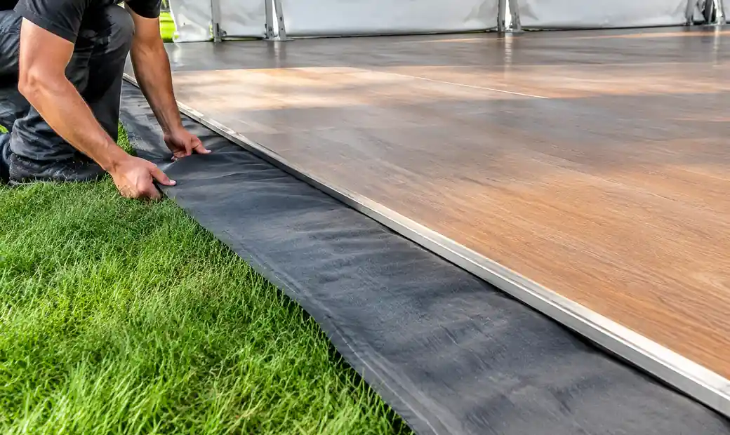 4-tent-flooring-installation-grass-lawn-site
