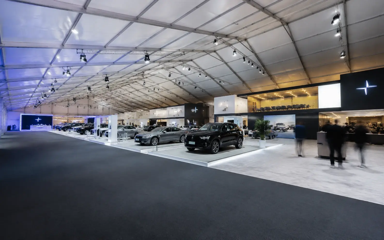 Professional exhibition tent interior with booth displays